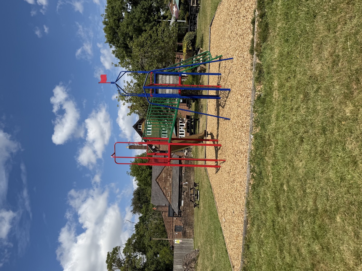 Colourful play equipment in the garden at Manor Farm, Rainhill